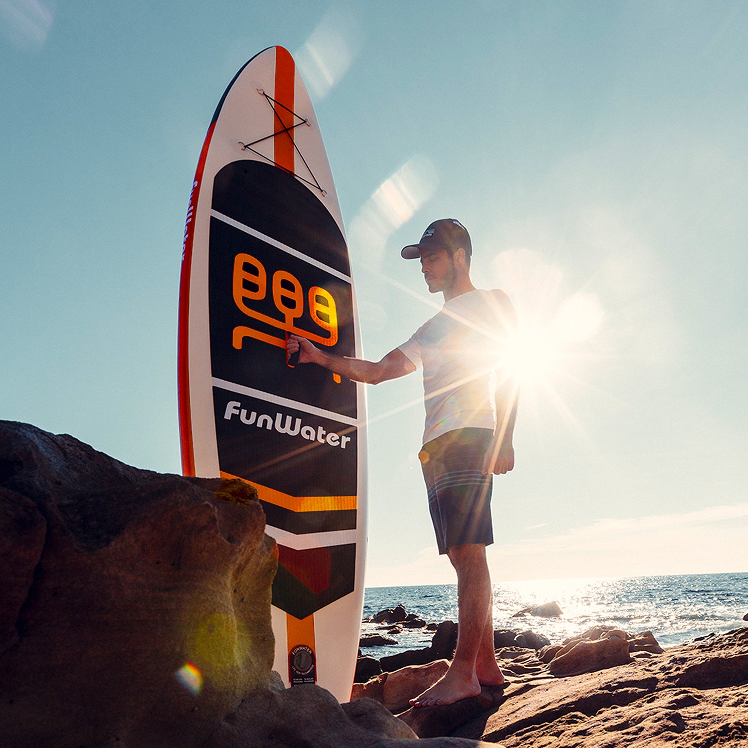 A man hold on Stand Up Inflatable Paddle Board